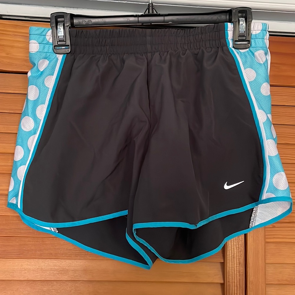 Women’s Nike grey athletic shorts with polka dot detail